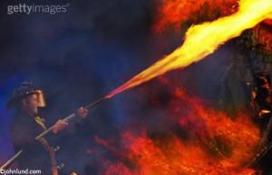Fire fighter with flame thrower